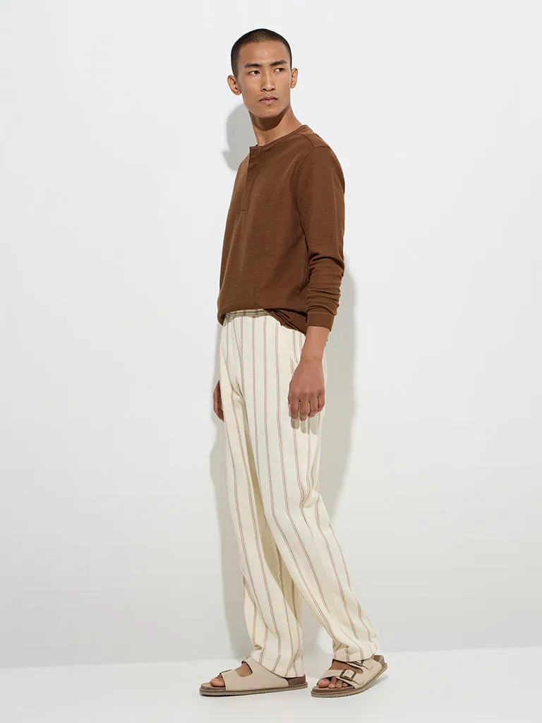ETA Off-White Stripe Printed Relaxed-Fit Mid-Rise Cotton Chinos