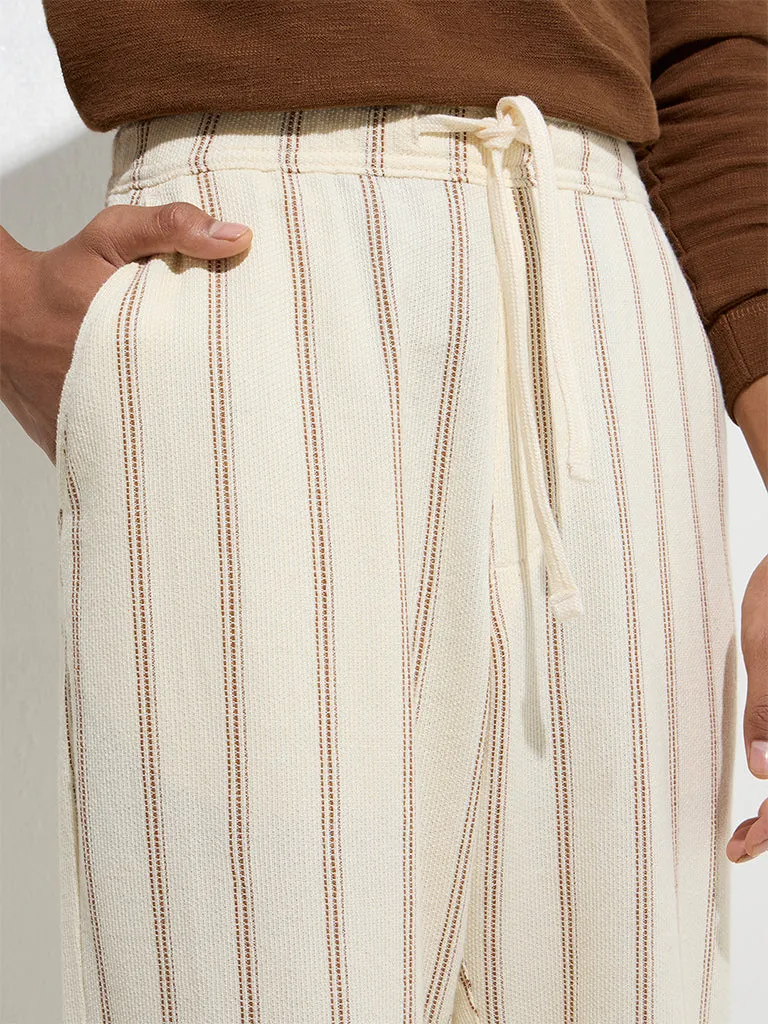 ETA Off-White Stripe Printed Relaxed-Fit Mid-Rise Cotton Chinos