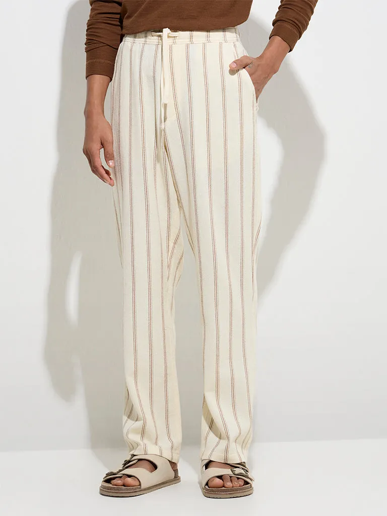 ETA Off-White Stripe Printed Relaxed-Fit Mid-Rise Cotton Chinos