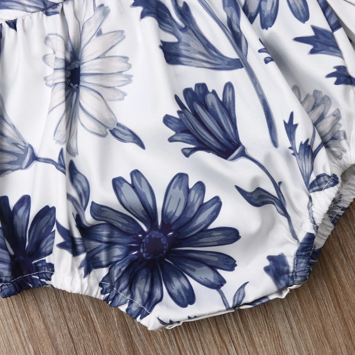 Tanzie Blue Daisy Ruffle Romper