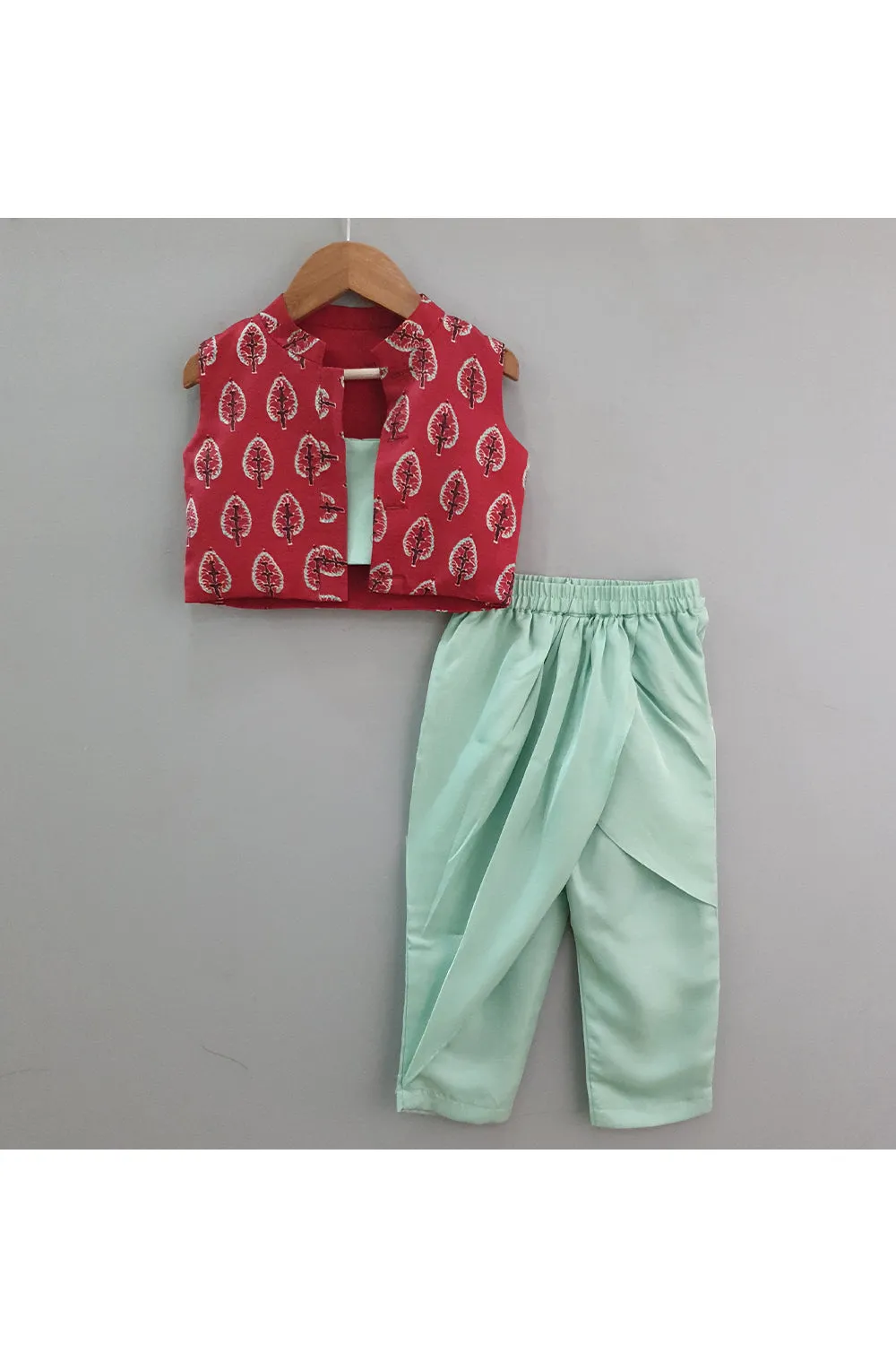 Teal green top and drape pants with maroon printed sleeveless jacket